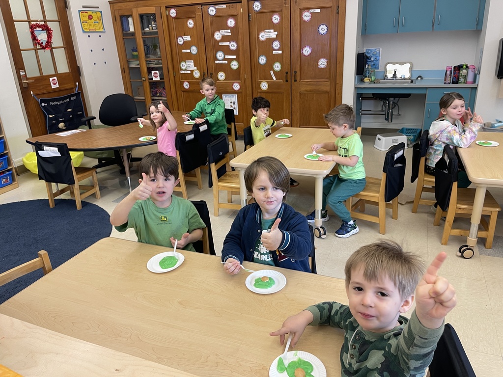 students eating food at tables