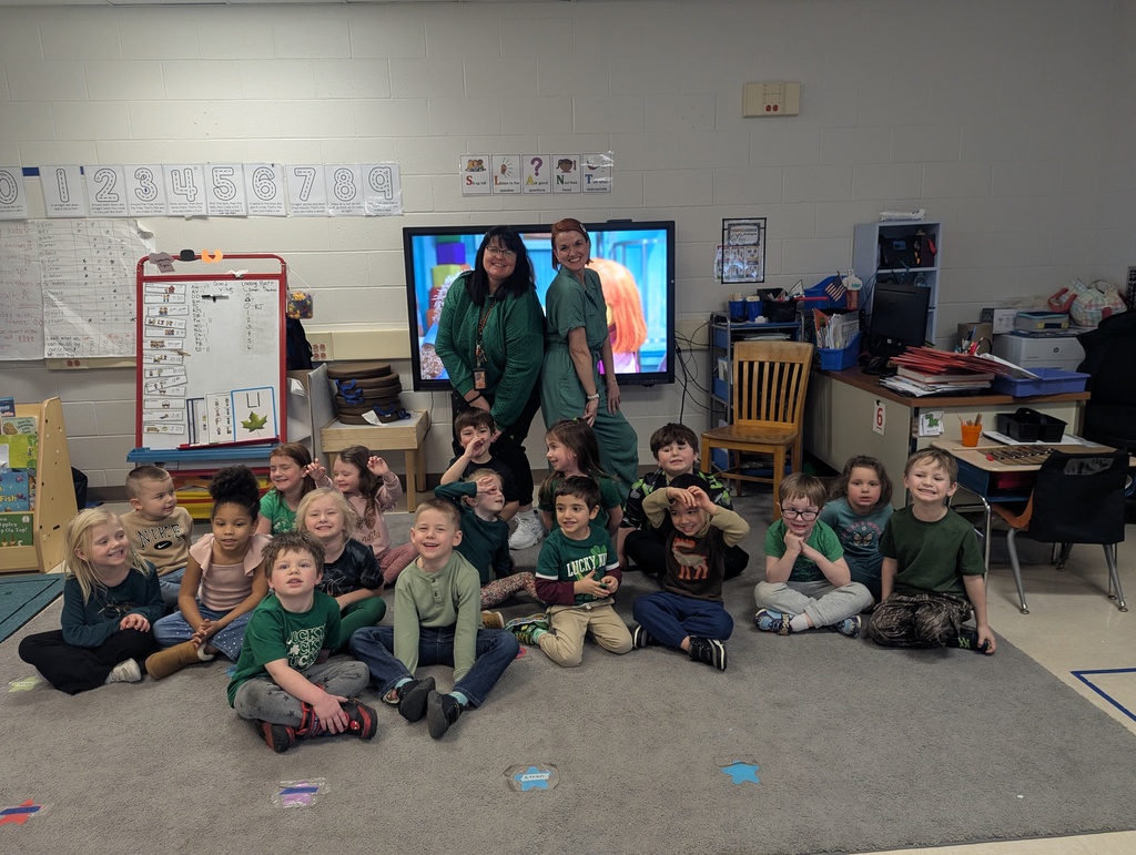 students and teachers in room