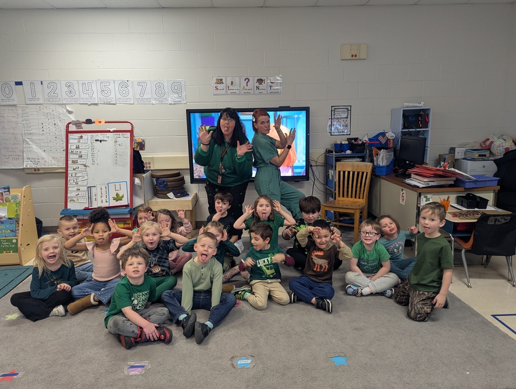 students and teachers in room