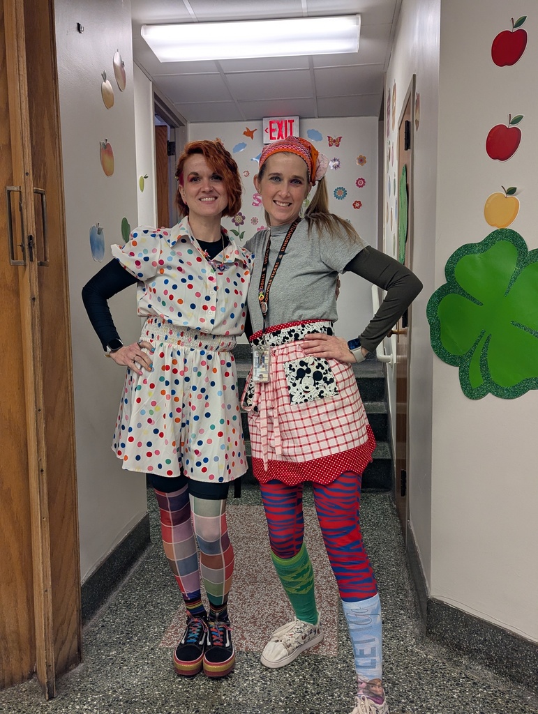 two teachers standing together