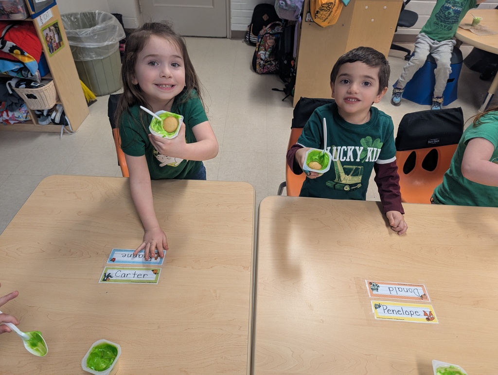 two students eating snacks