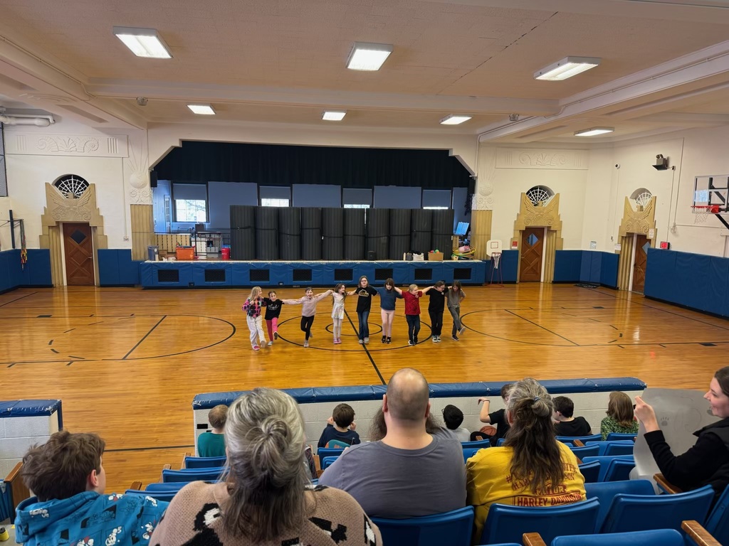 students lined up in gym