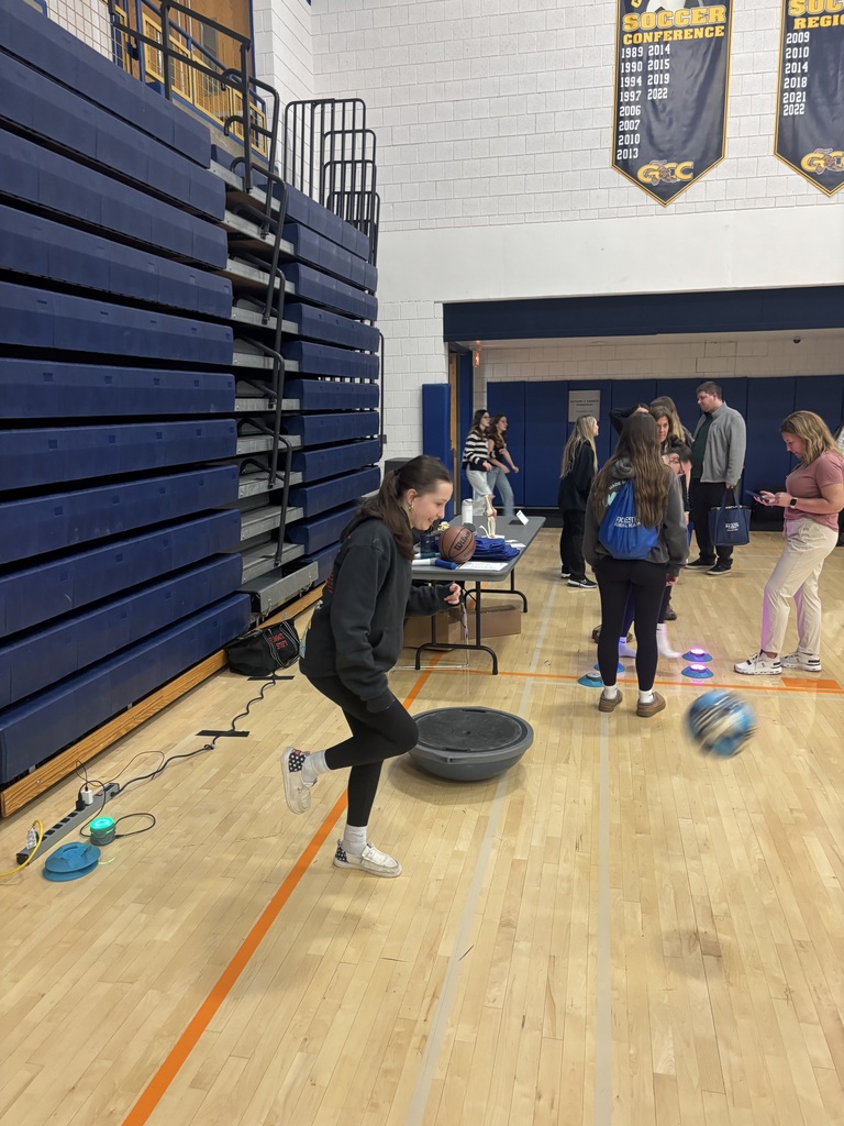 a student kicking a ball