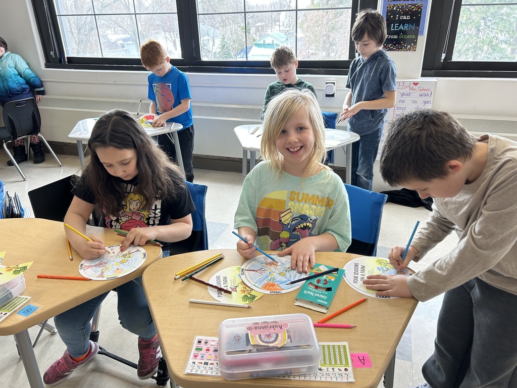 students working on project at desk