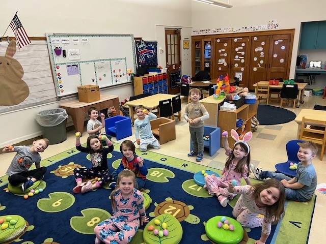 students playing together in classroom