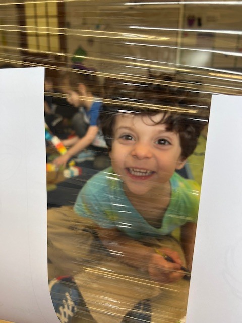 student looking through window in worksheets