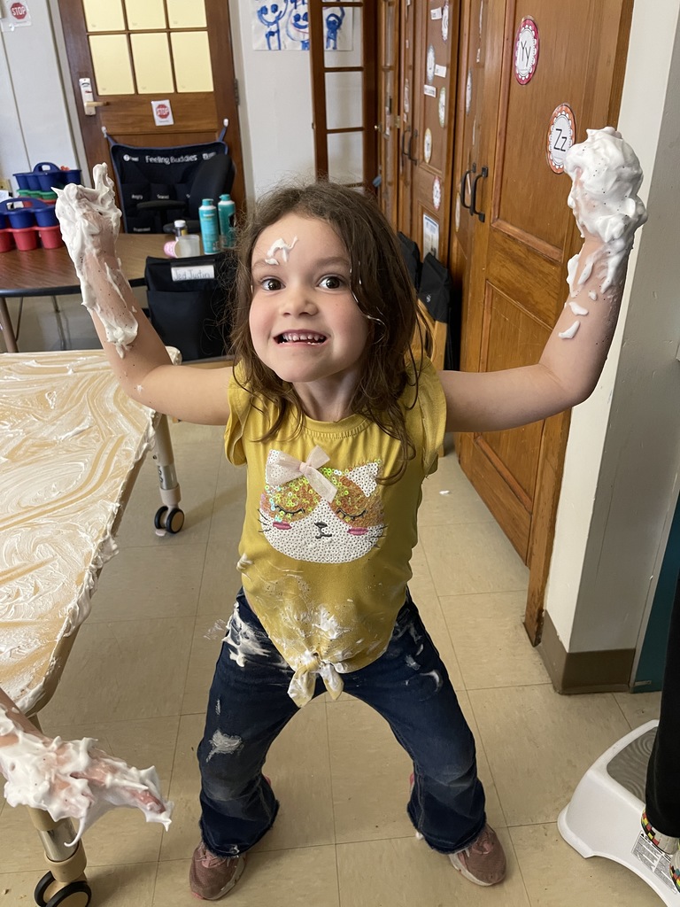 student playing with shaving cream