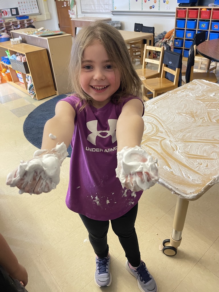 student playing with shaving cream