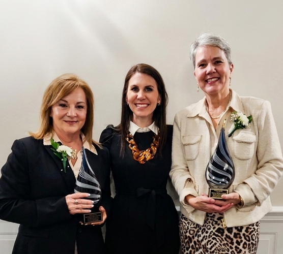 three women standing together