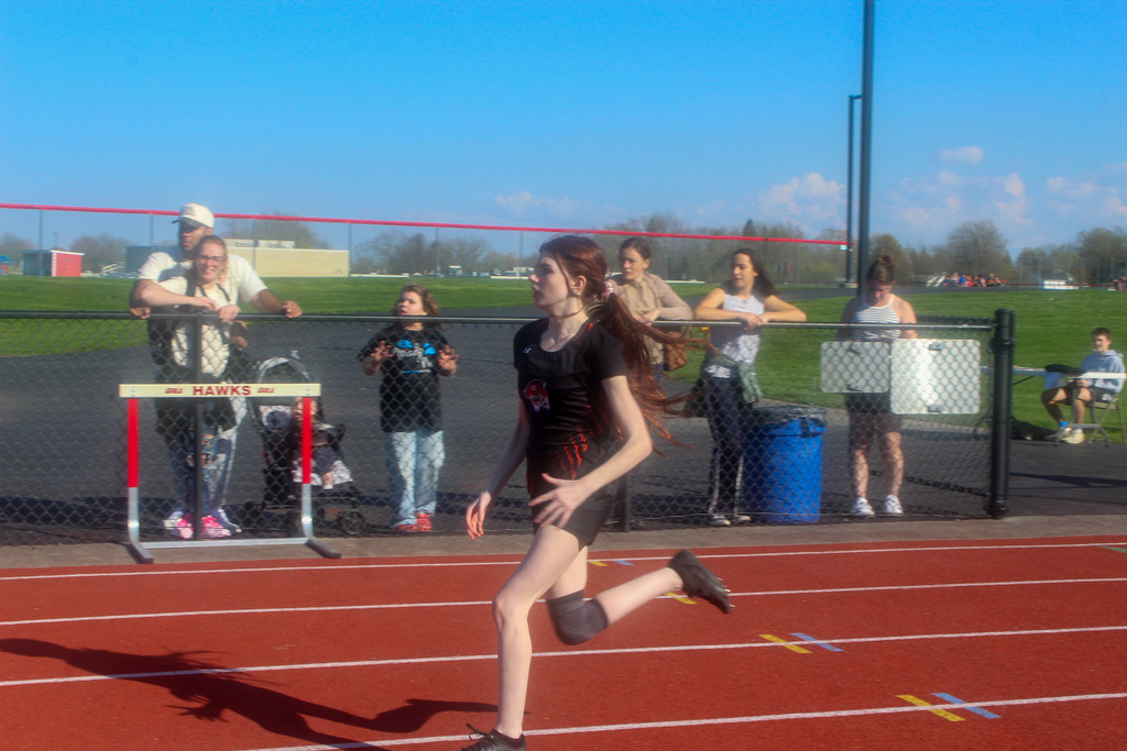 girl running on track
