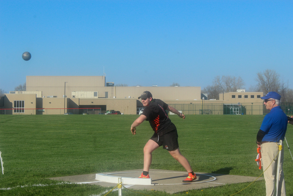 boy throwing shotput