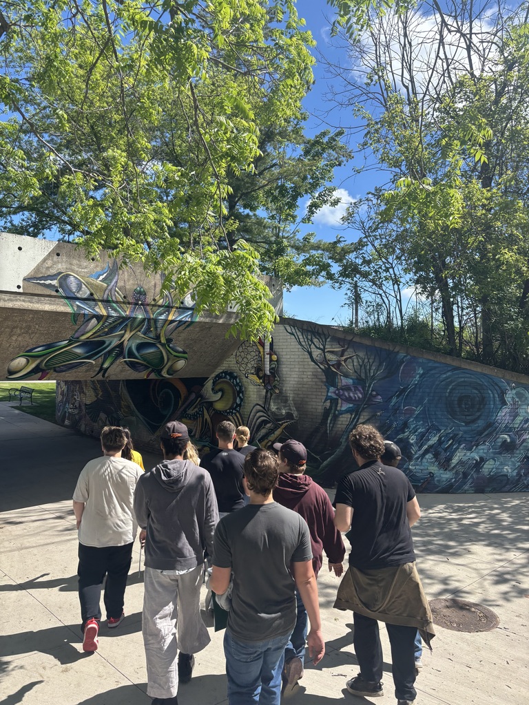 students walking around on college campus