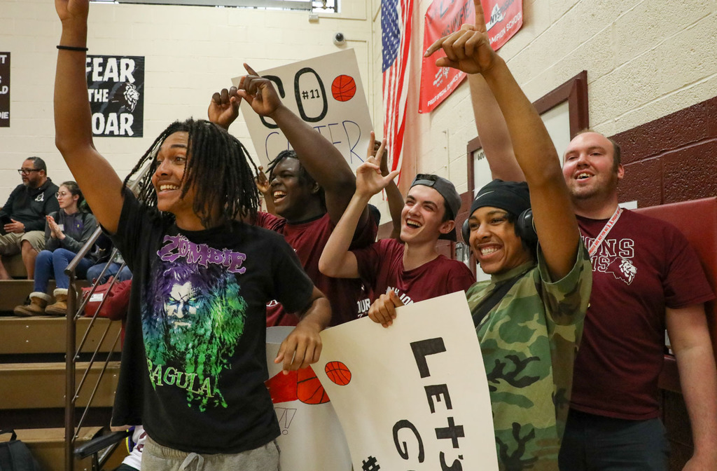 varsity basketball team cheering