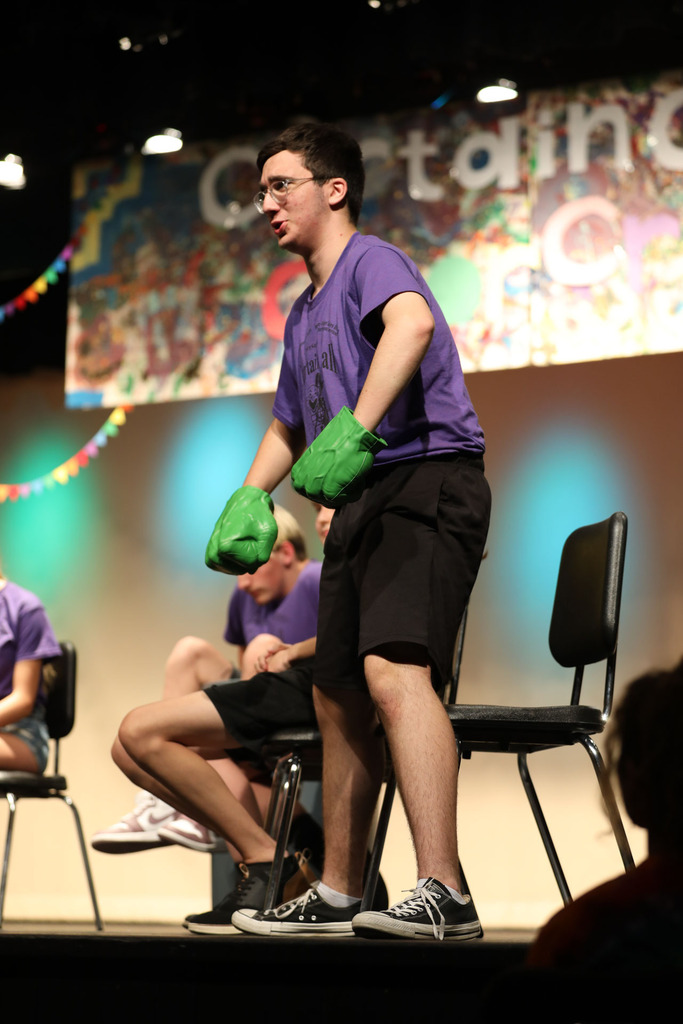 student acting on stage