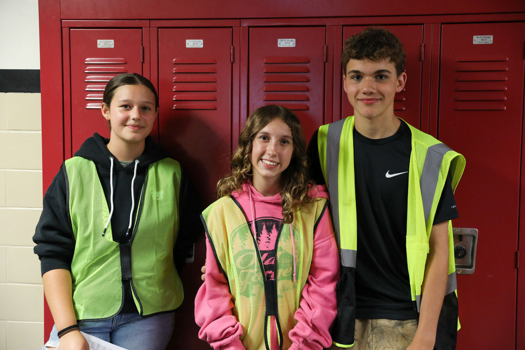 orientation leaders in front of lockers
