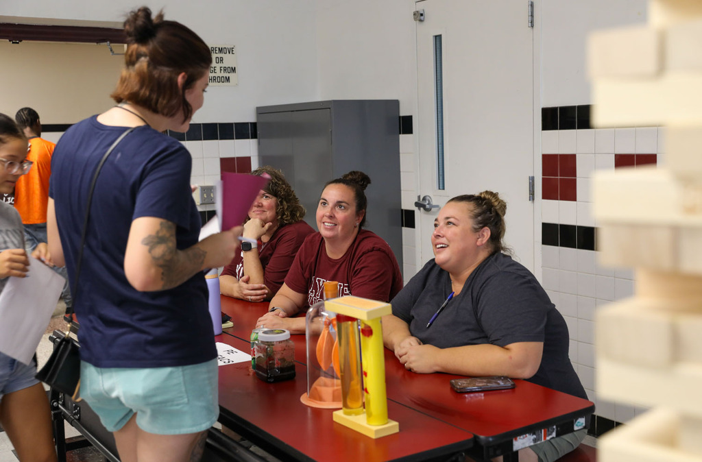 teachers talking to students