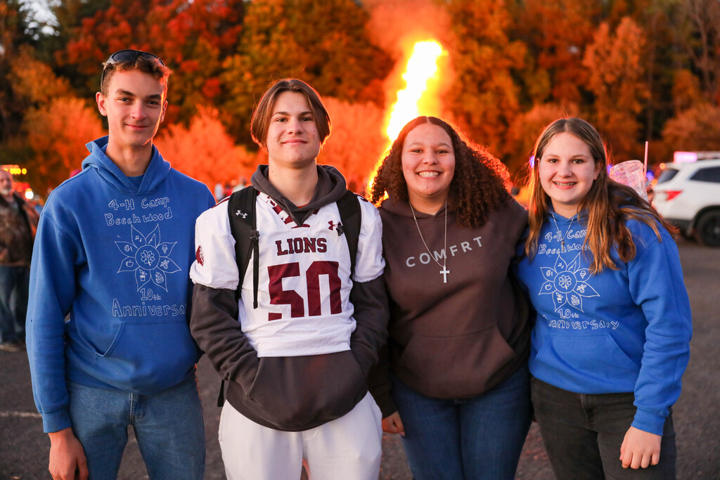 students in front of bon fire