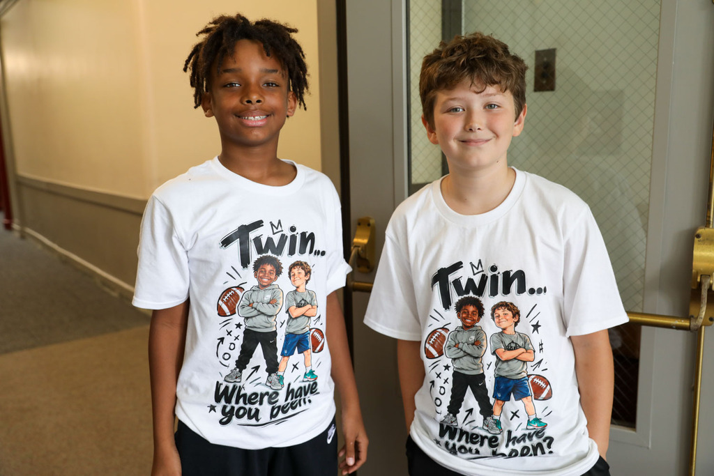 students with twin shirts