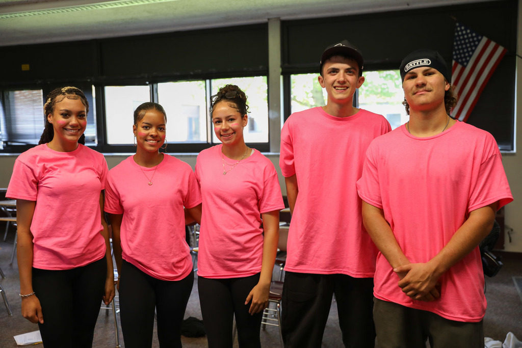groupu of students in matching shirts
