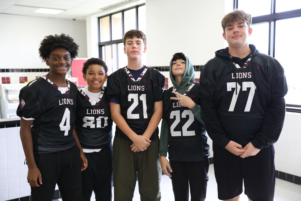 group of football boys twining
