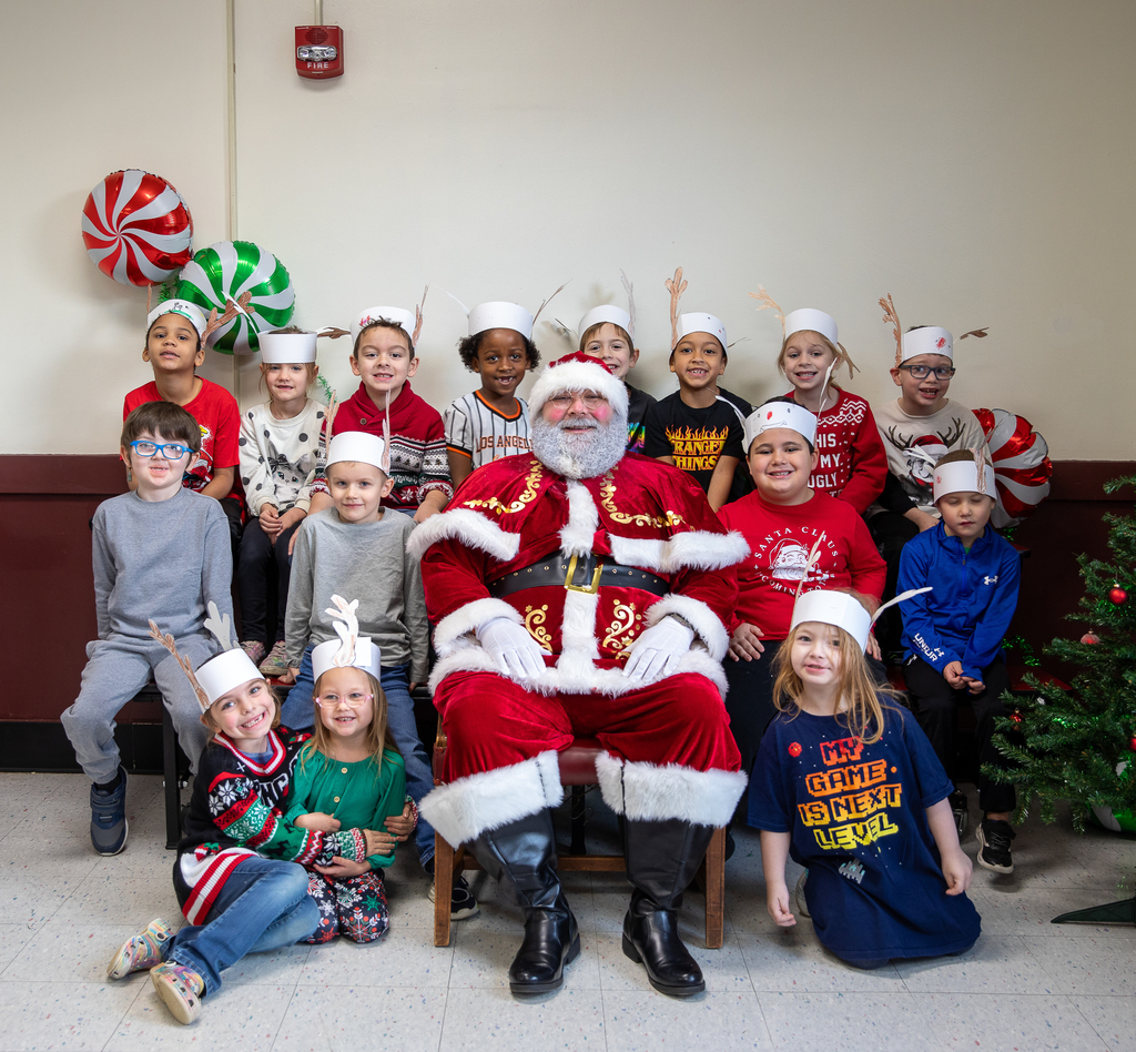 kids sitting with Santa