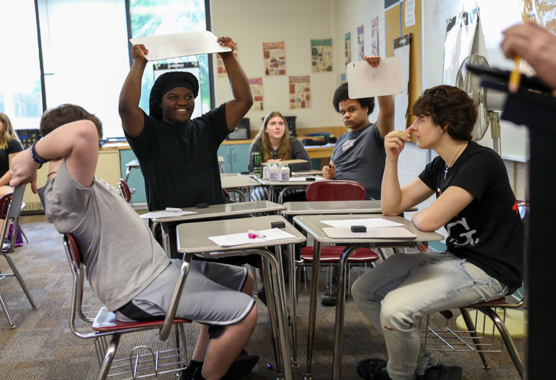 students playing game in class