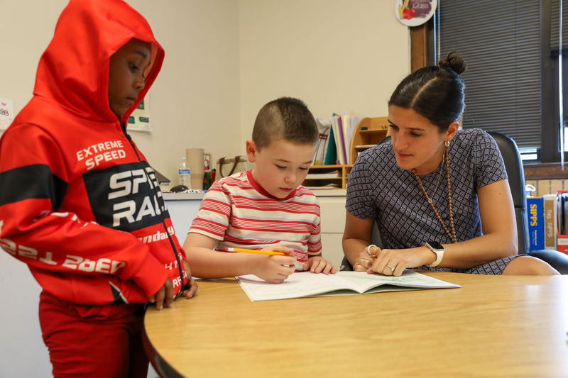 teacher with student