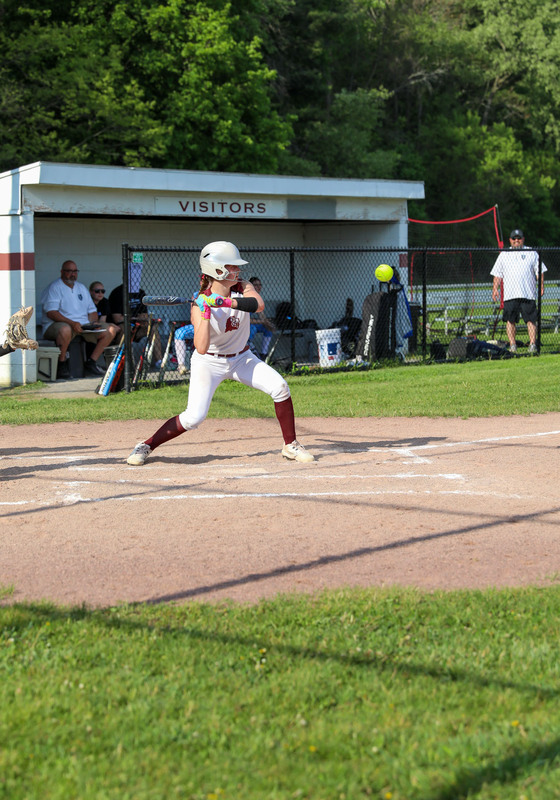 softball player batting