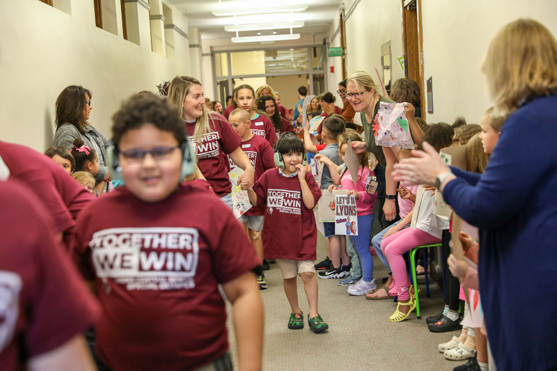 cheering for their classmates