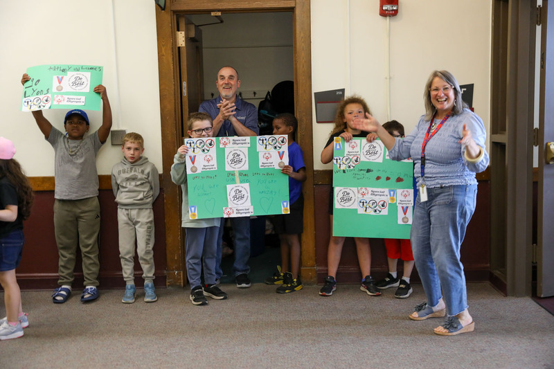 students holding signs