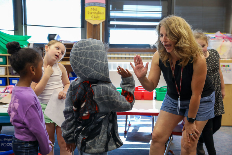 student teacher high five