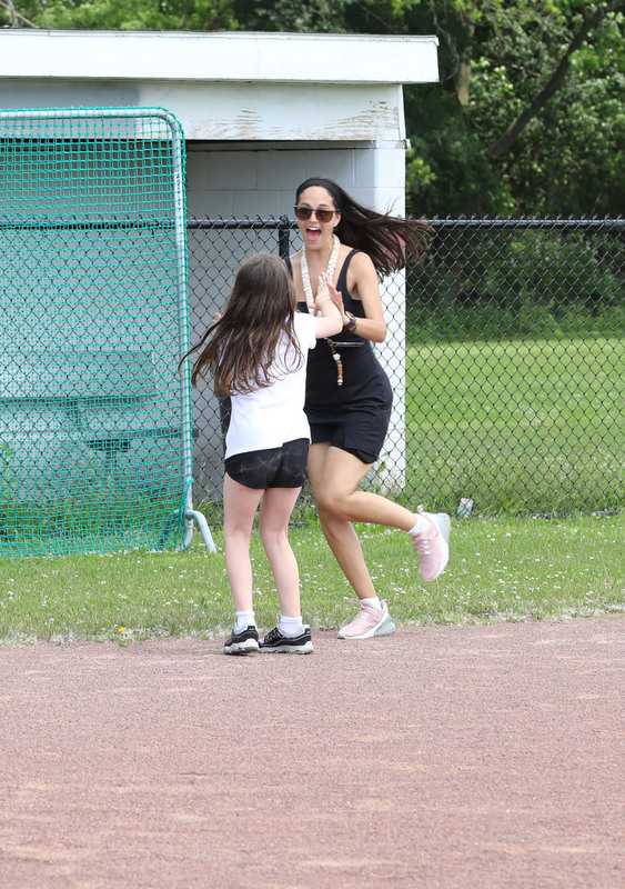 student and teacher high five