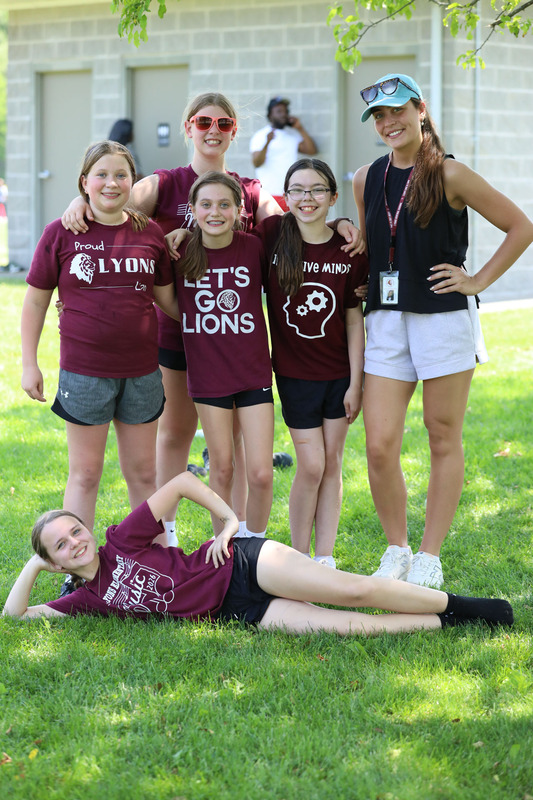 students and staff posing