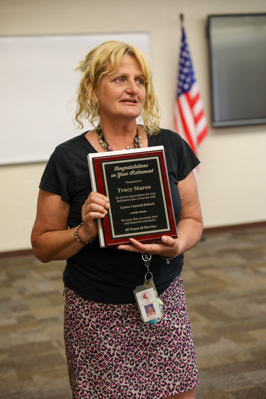 t. mares with retirement plaque