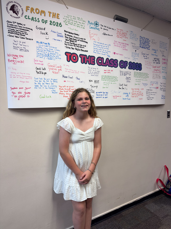 student with sign