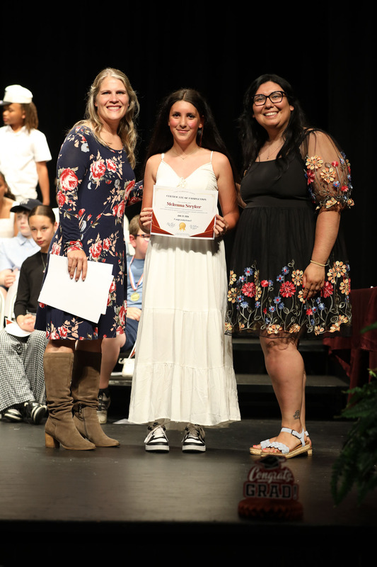 student getting diploma