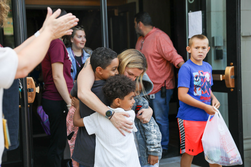 hugs by teacher