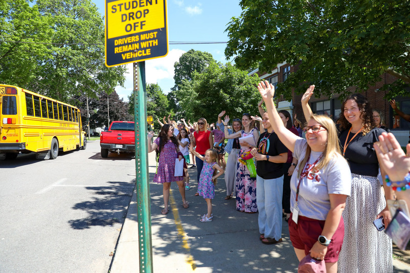 teachers waving goodbye