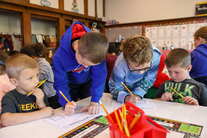students working at buddy day