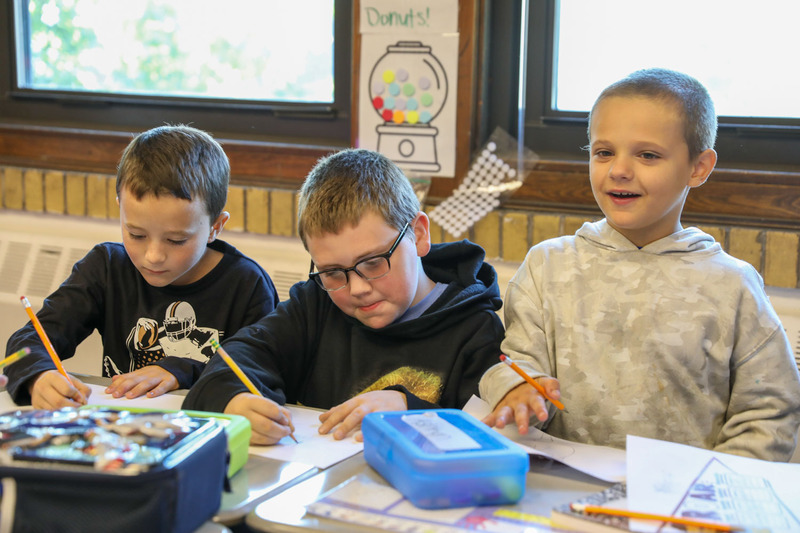 students working at buddy day