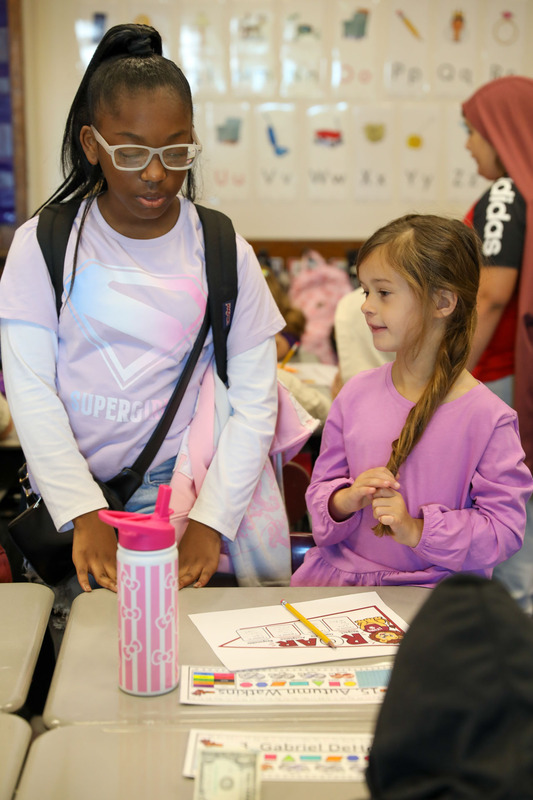 older and younger student at buddy day
