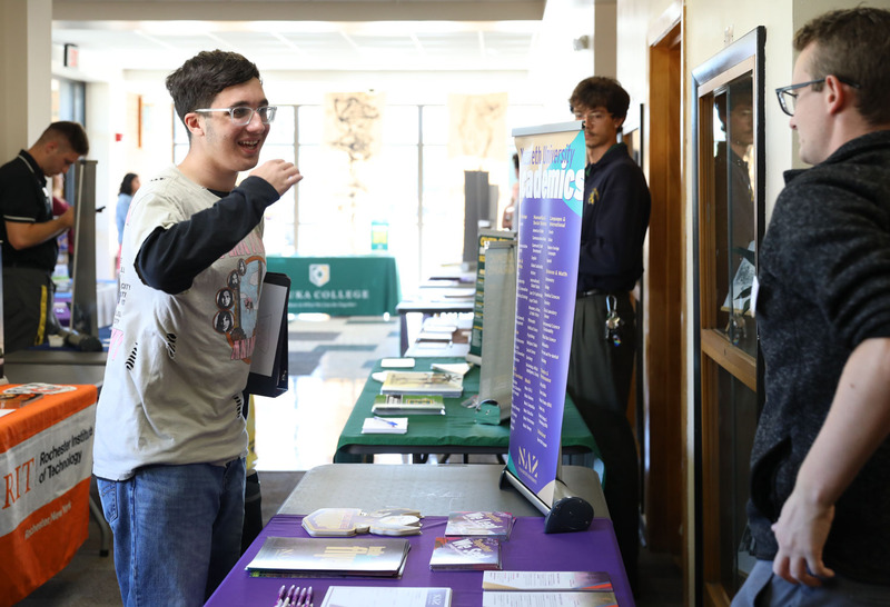 student at college fair
