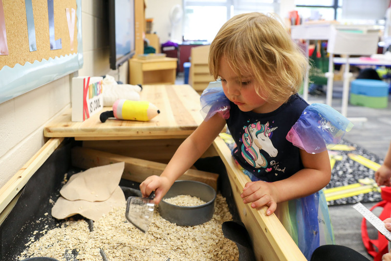 3upk student playing in sensory station