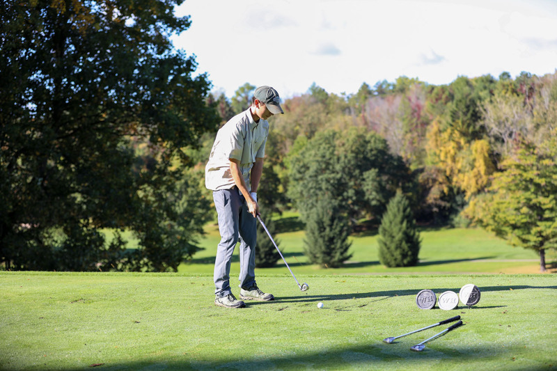 golfer nick johnson getting ready to hit the ball