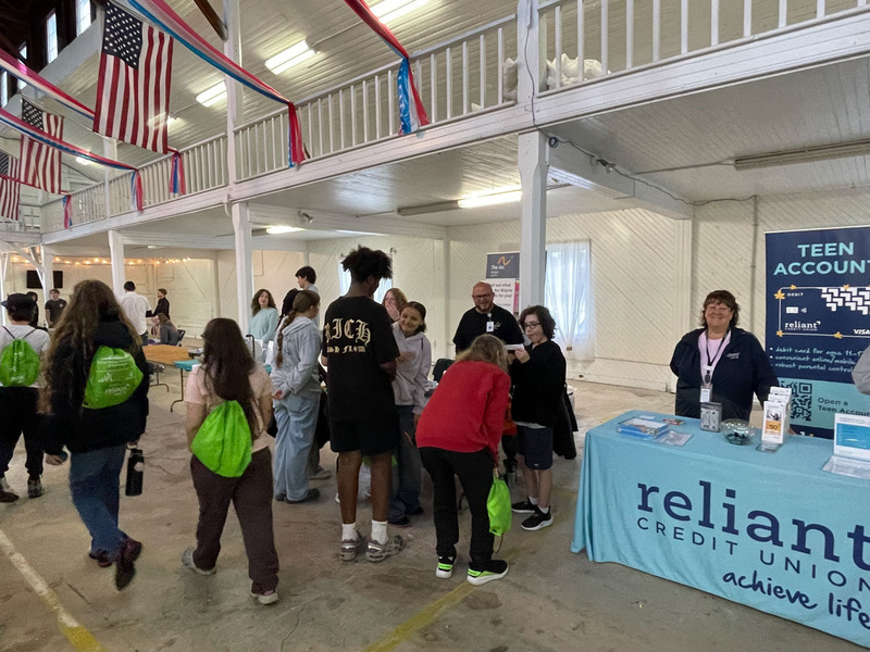 students at the career carnival talking to vendors