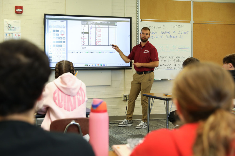 Mr. Lawson teaching at the board