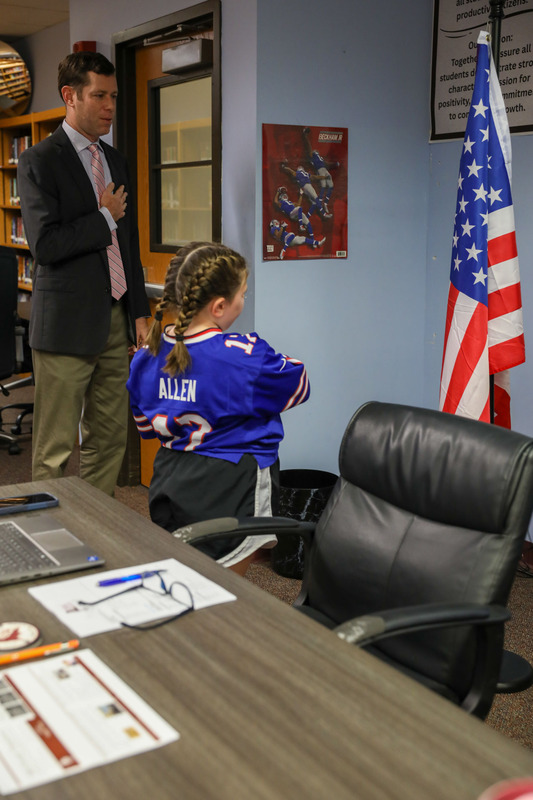 student giving the pledge