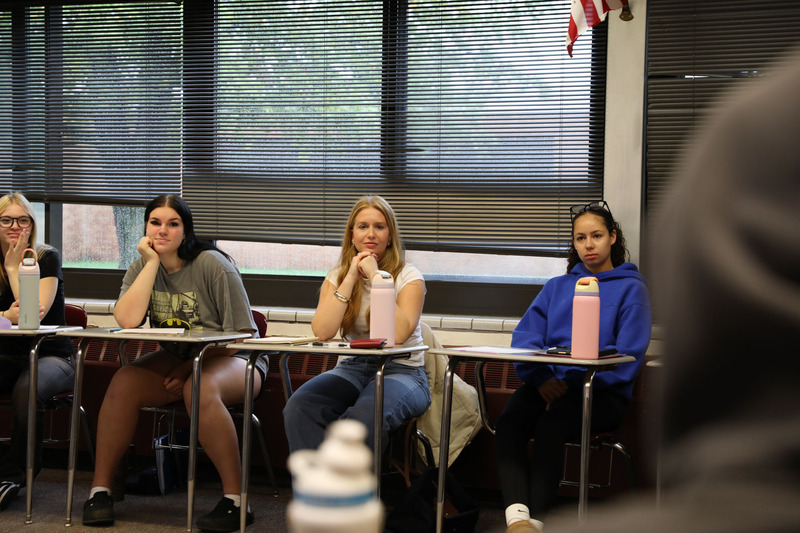 cori talking with students