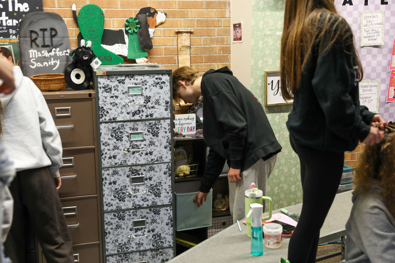 student looking around during scavenger hunt