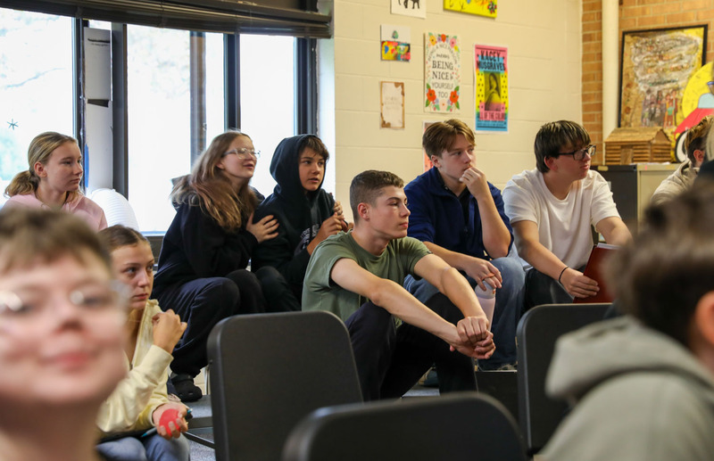 students anxiously waiting to hear what the musical is